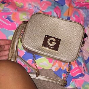 Gold guess purse